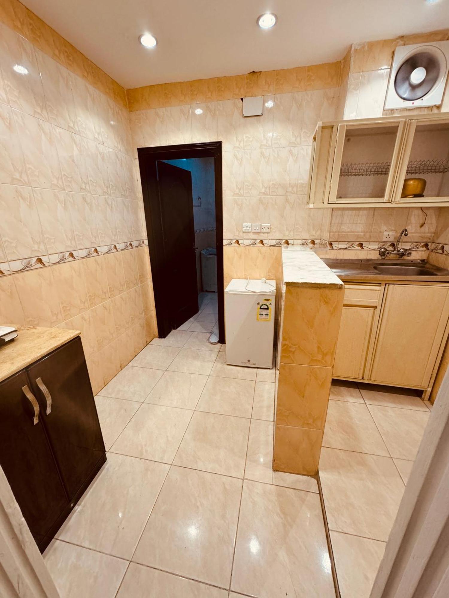 אום לאג' Aroos Al Shati Furnished Units מראה חיצוני תמונה